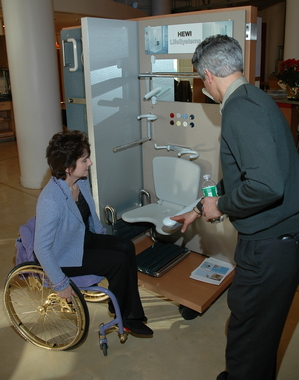 Rosemarie Rossetti learns about accessible bath fixtures from product manager at Hafele showroom New York City