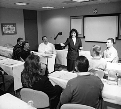Rosemarie Rossetti teaching at at corporate client's training room